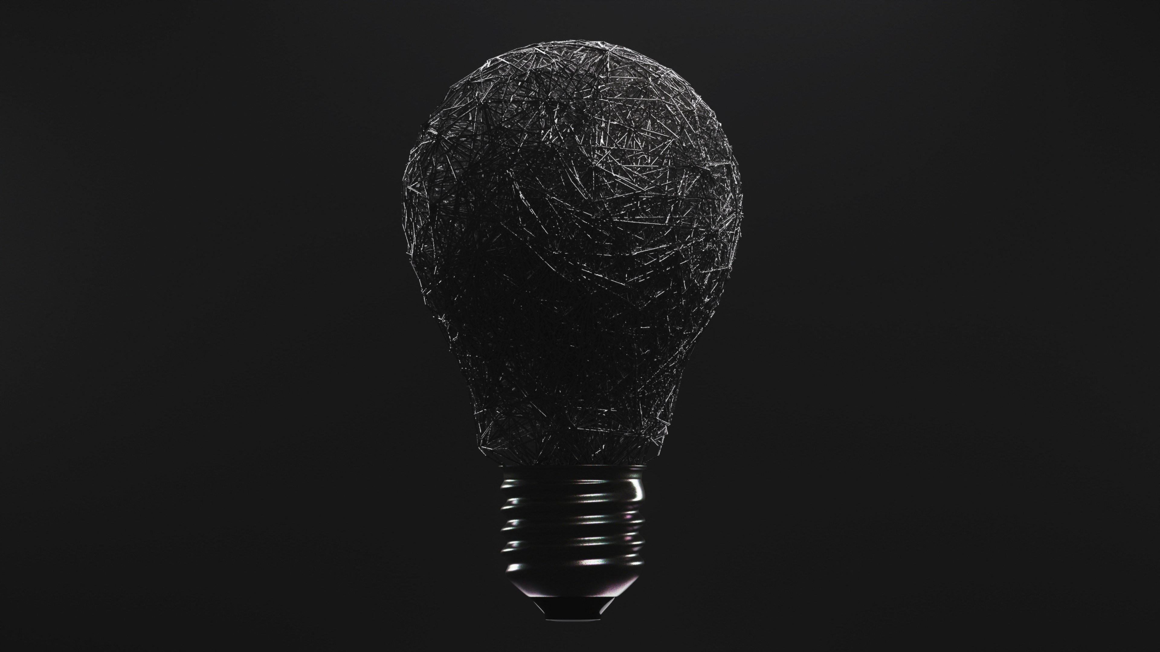 a black and white photo of a light bulb