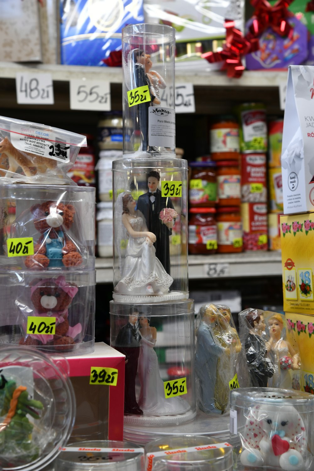 a display of wedding figurines in a store