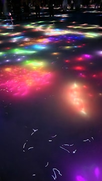 Colorful LED light panels illuminating a modern event space with dynamic patterns.