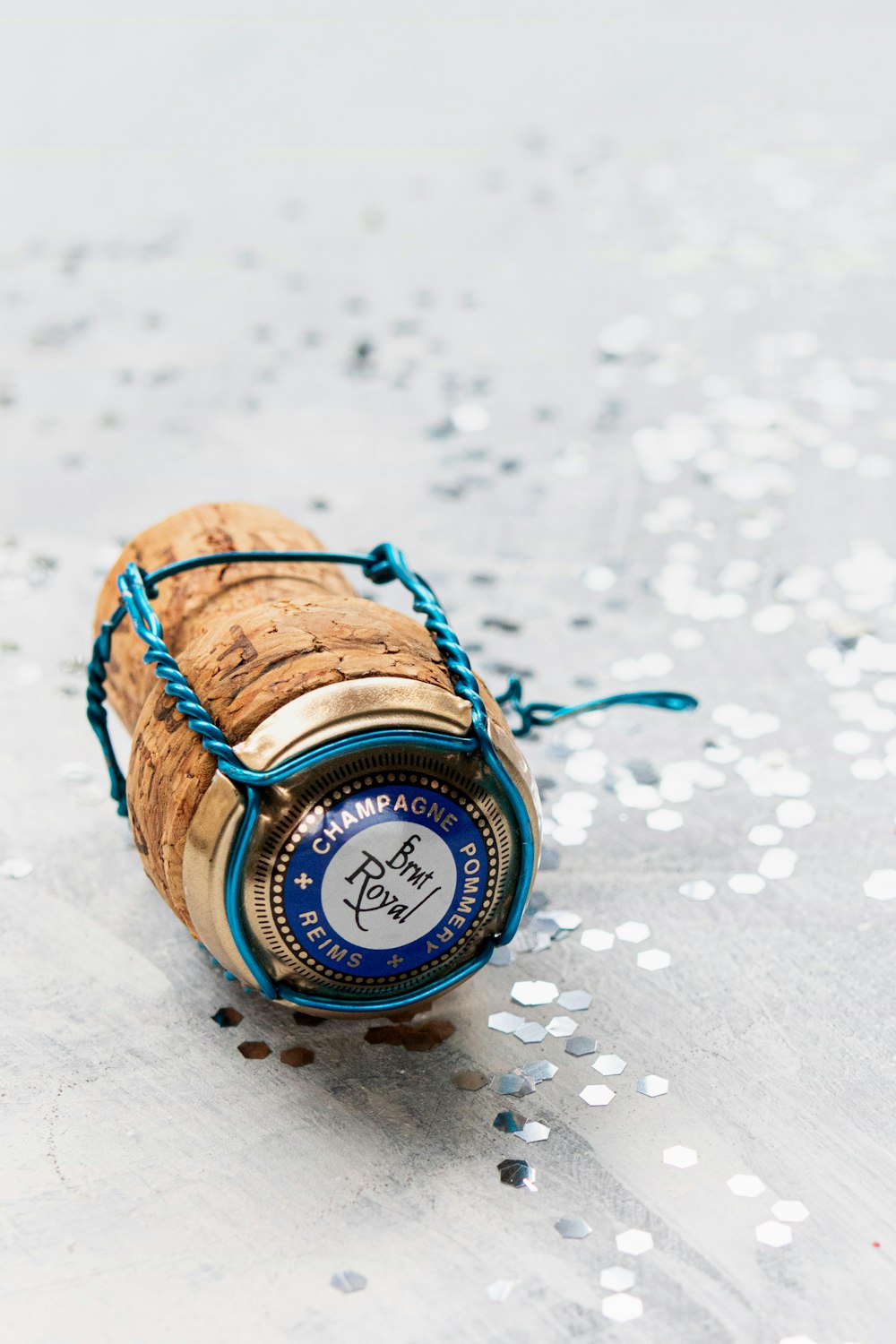 a cork with a blue string around it