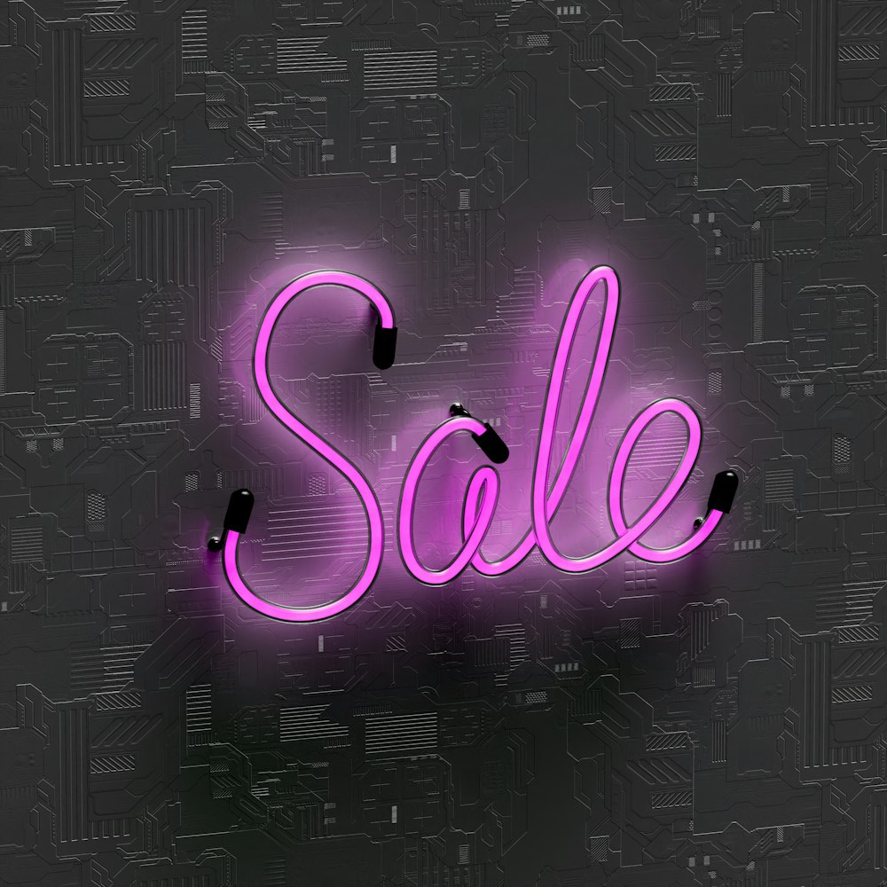 a neon sign that says sale on it
