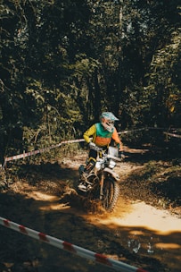 Rider navigating a challenging rocky trail during a special enduro weekend event.