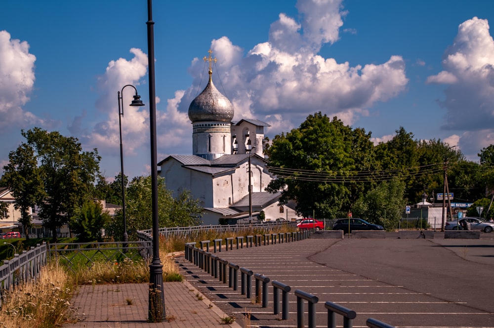 a large white building with a steeple on top of it