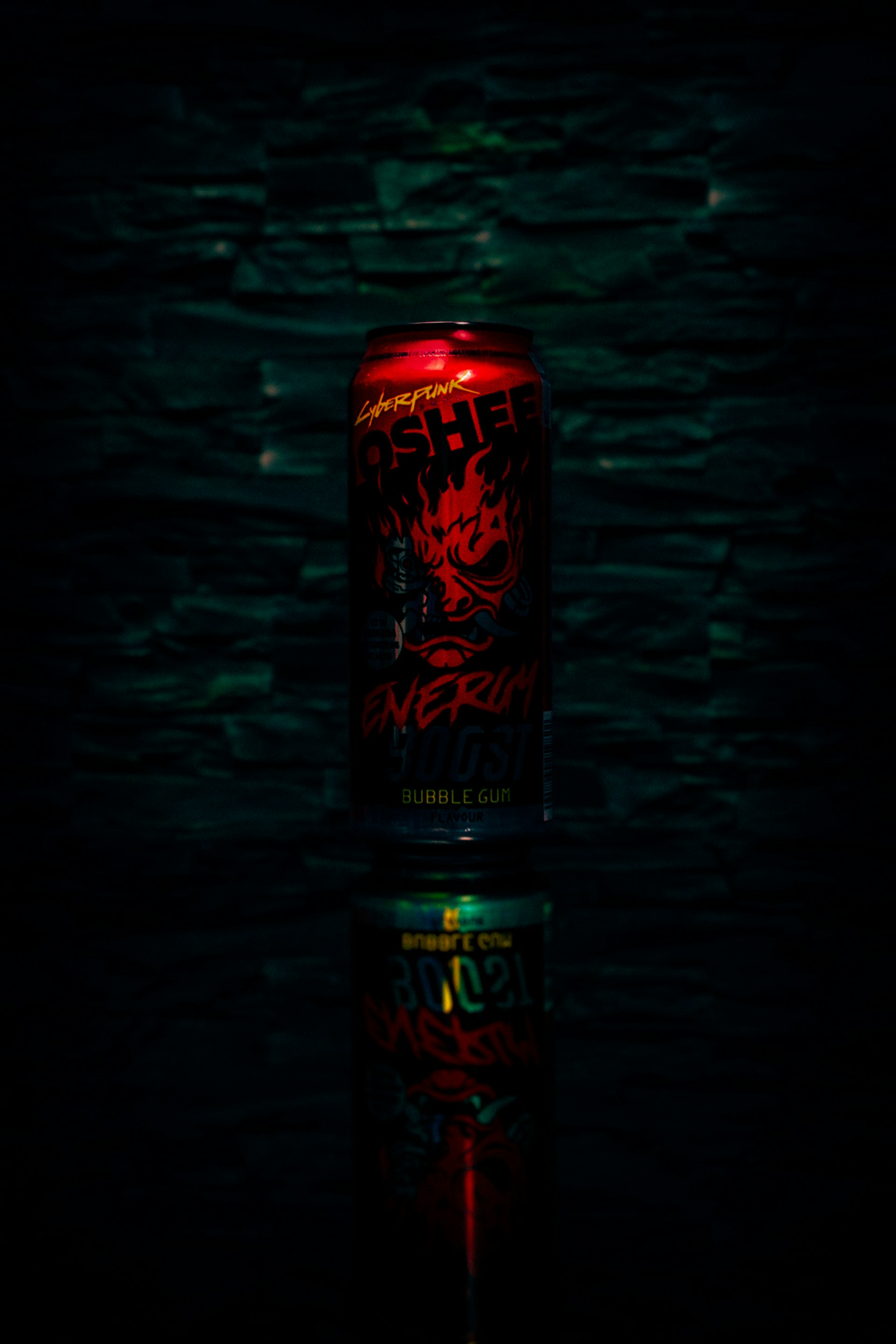 a can of beer sitting on top of a table