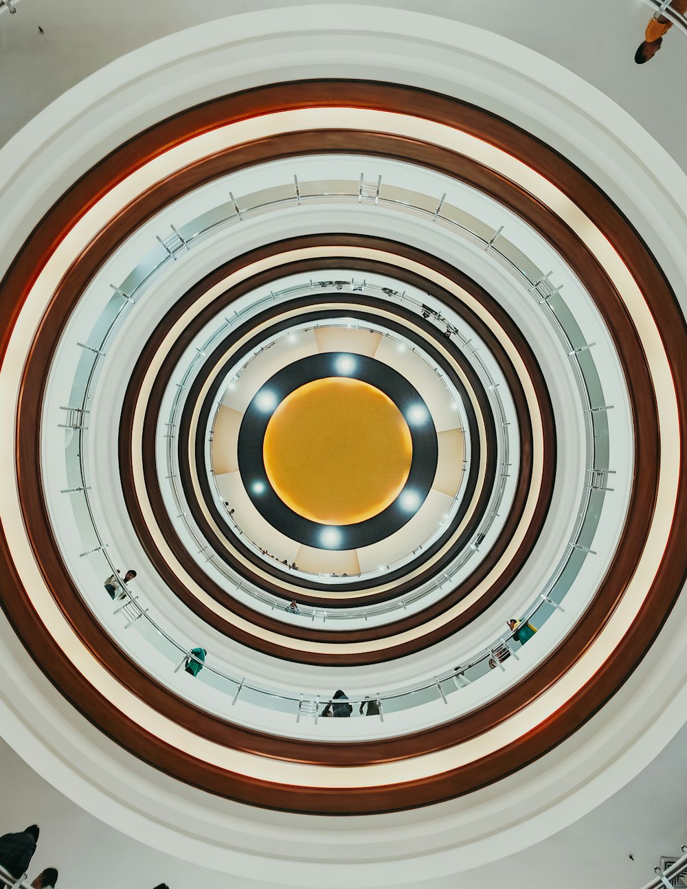 an overhead view of a circular ceiling in a building