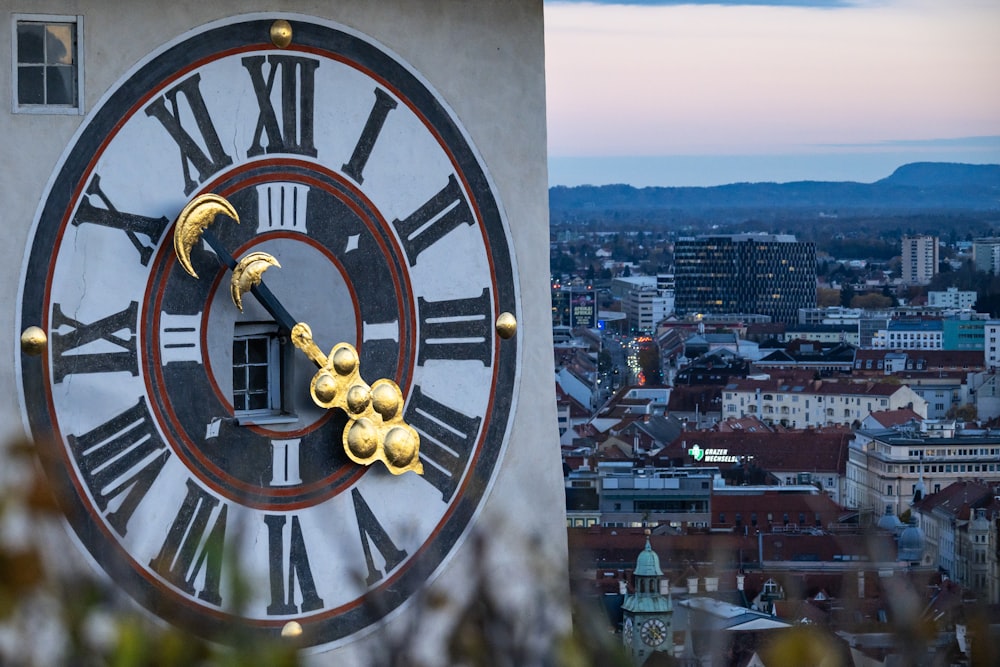 a large clock on the side of a building