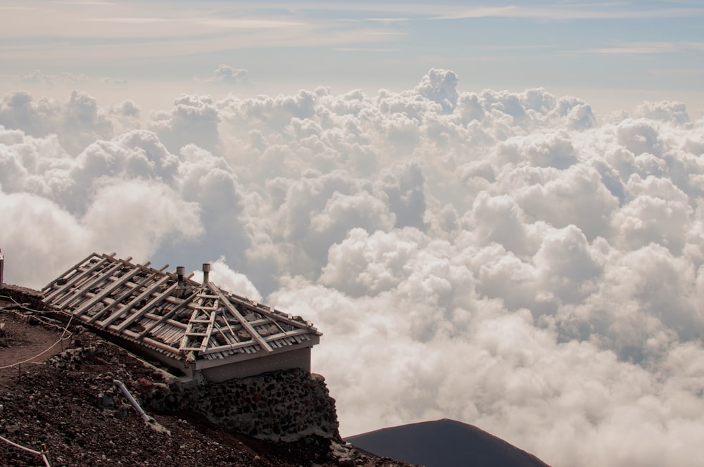 a view of the clouds from the top of a mountain