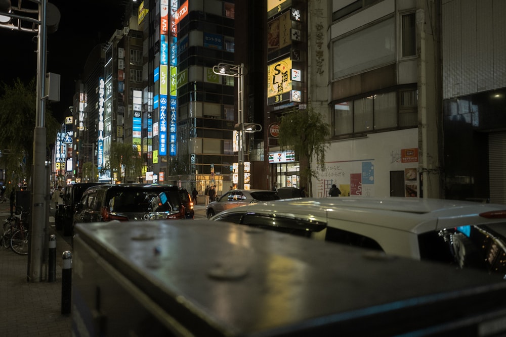 a city street filled with lots of tall buildings