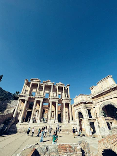 a group of people standing in front of a building
