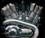 Close-up of fresh oil being poured into a motorcycle engine at United Lubricants.