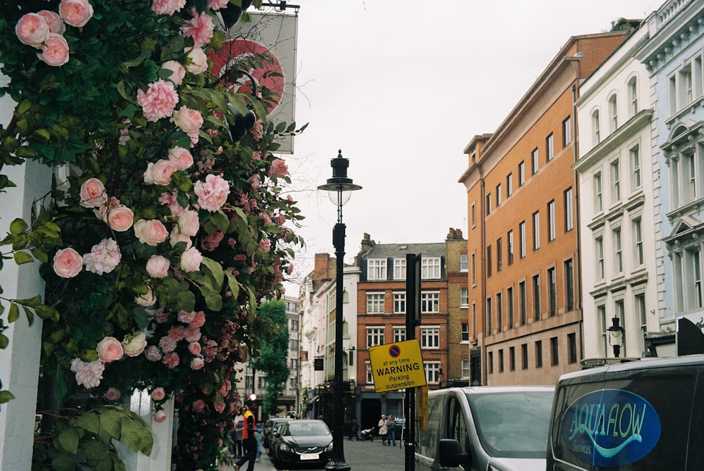 a city street with cars parked on the side of it