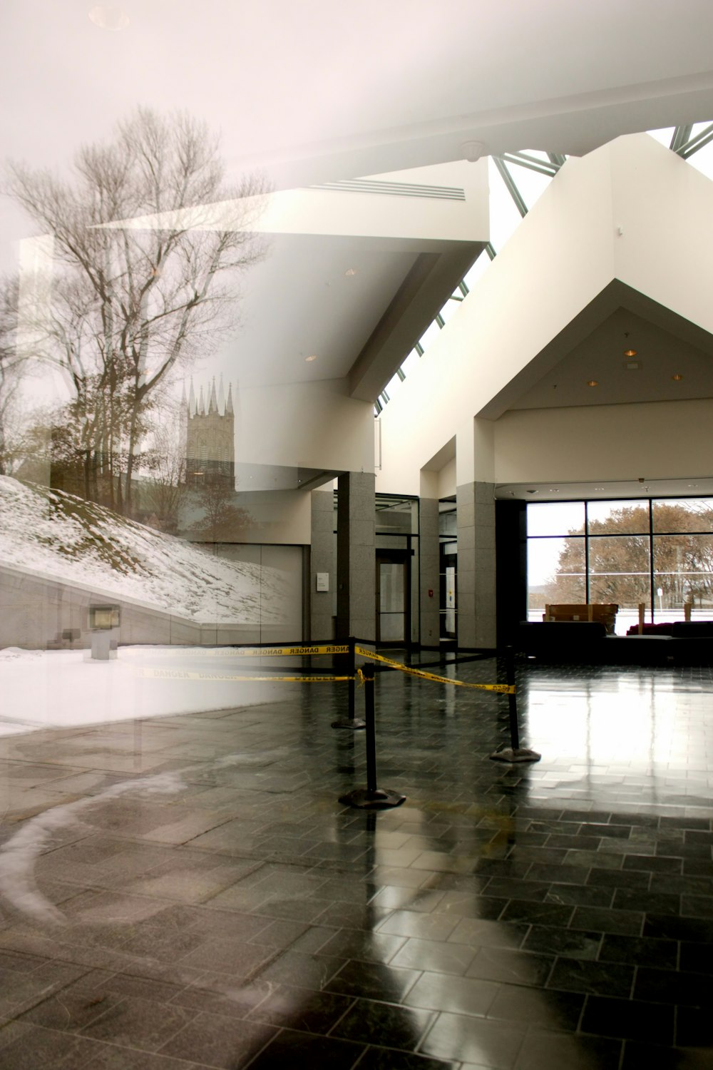 a large open room with a clock on the wall