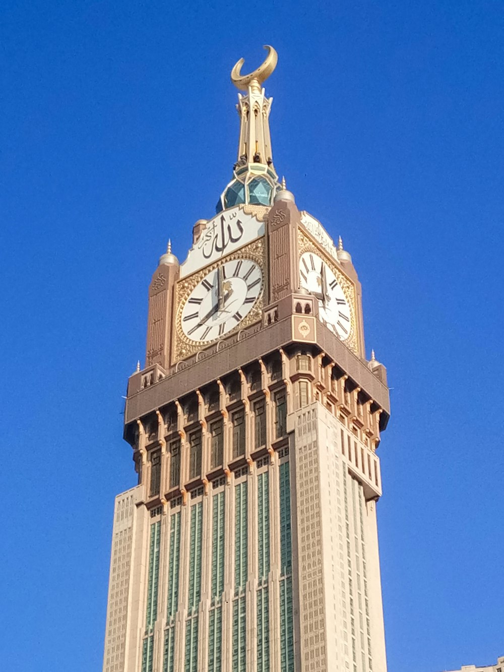 a tall clock tower with a sky background