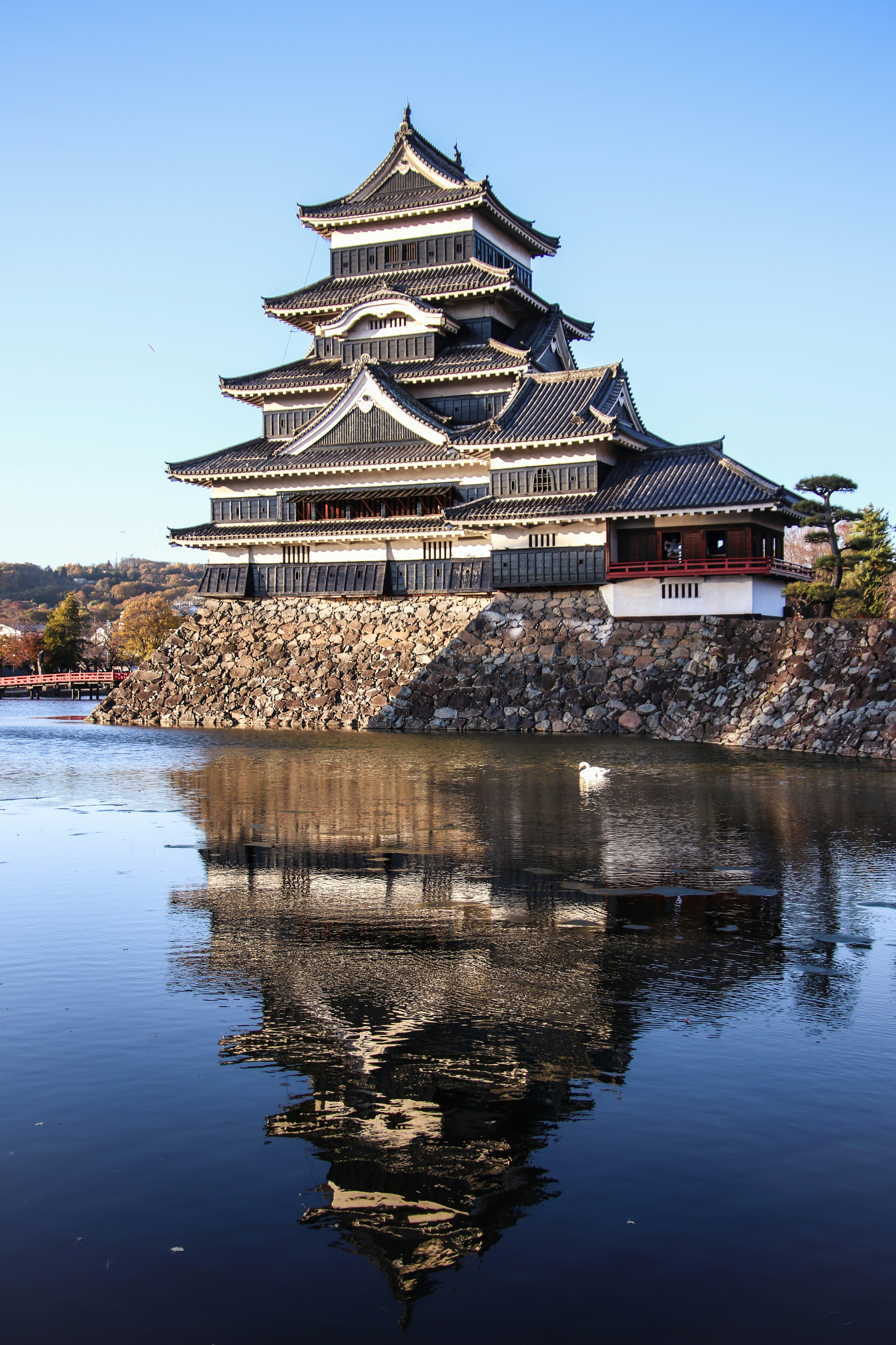 a large building sitting on top of a body of water