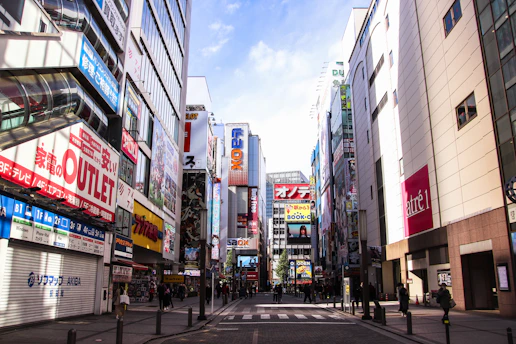 A vibrant snapshot of a bustling city street filled with colorful billboards and people immersed in the latest trends.