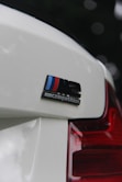 a close up of a bmw pvc emblem on a car