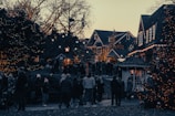 An inviting scene of a village gathering celebrating sustainability.