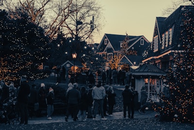A festive evening scene in Skibby with friends and family gathered around, ready to celebrate the upcoming wedding.