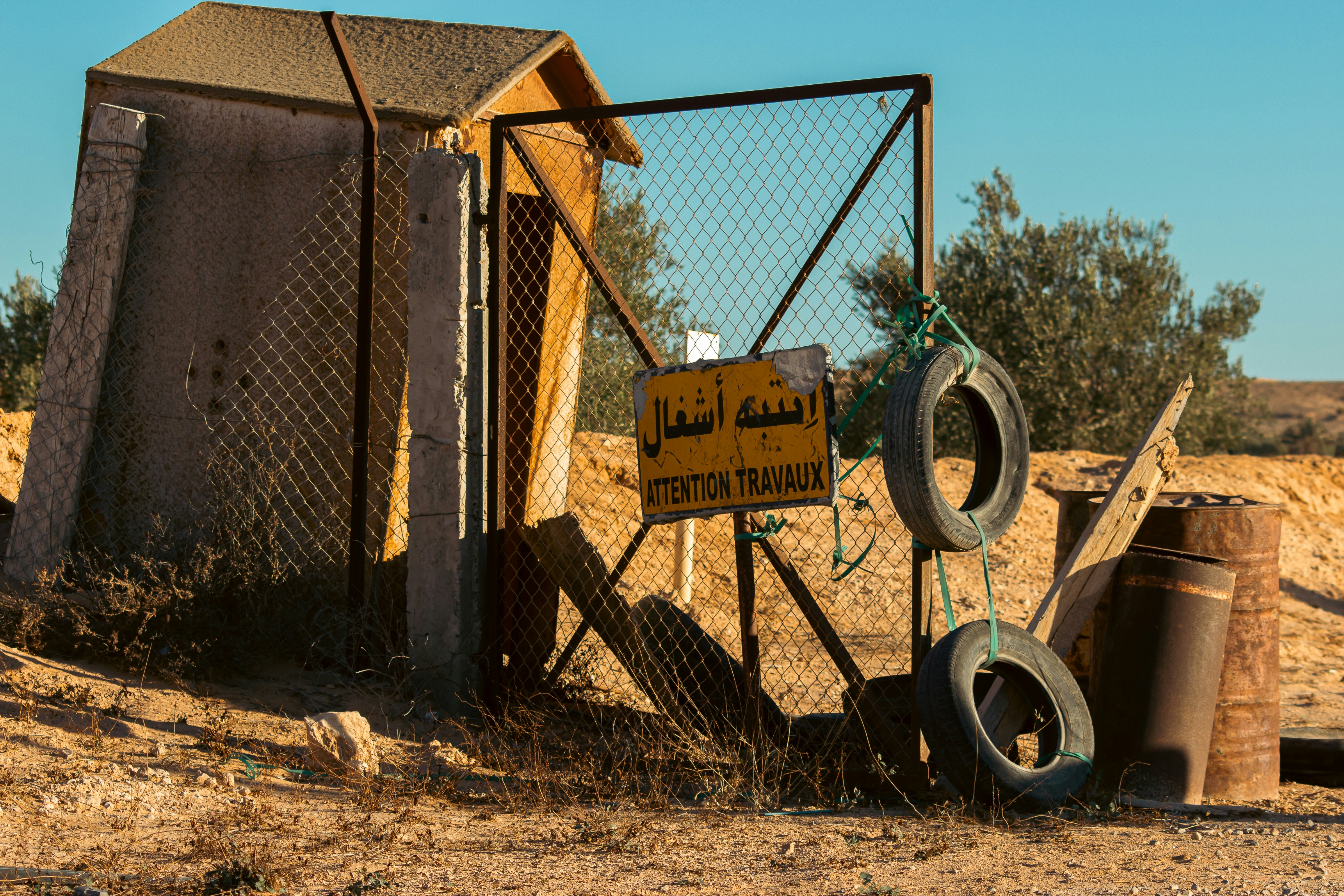 a fence that has some tires on it