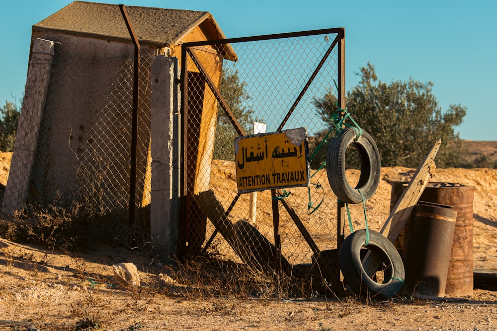 a fence that has some tires on it