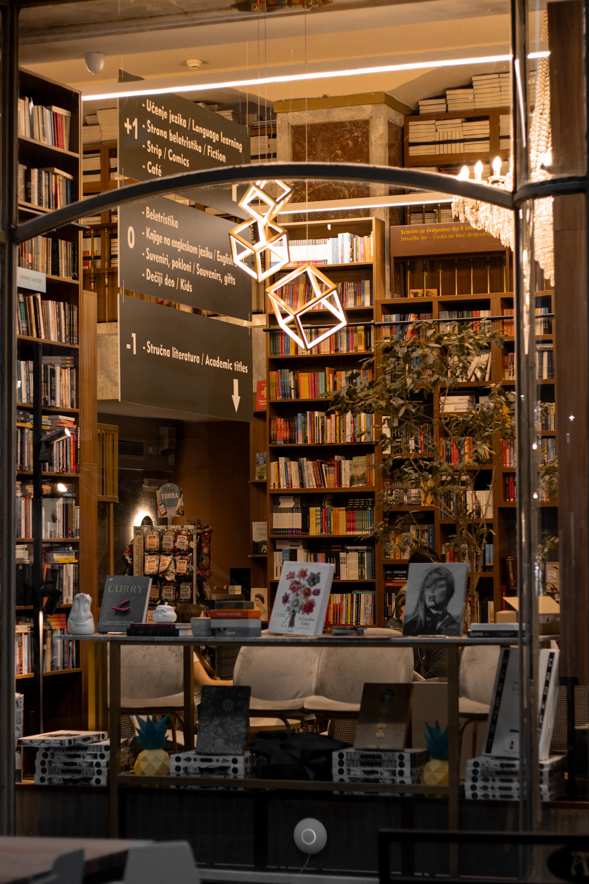 A bookshop filled with shelves and armchairs