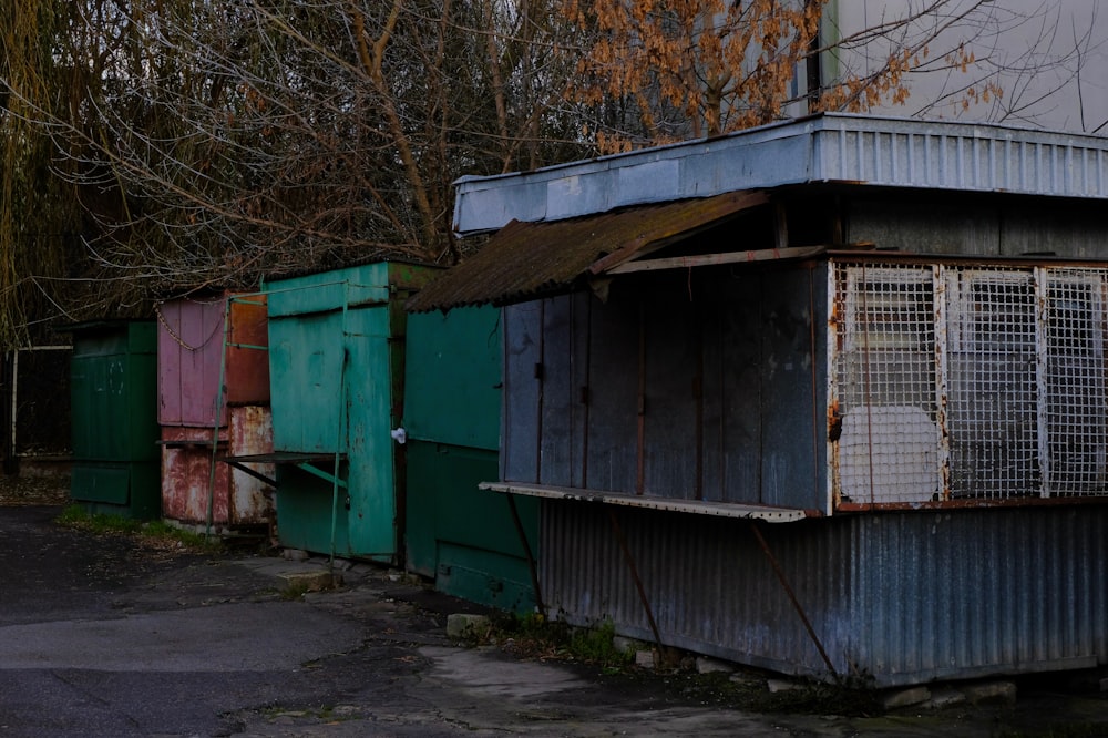 a row of metal buildings sitting next to each other