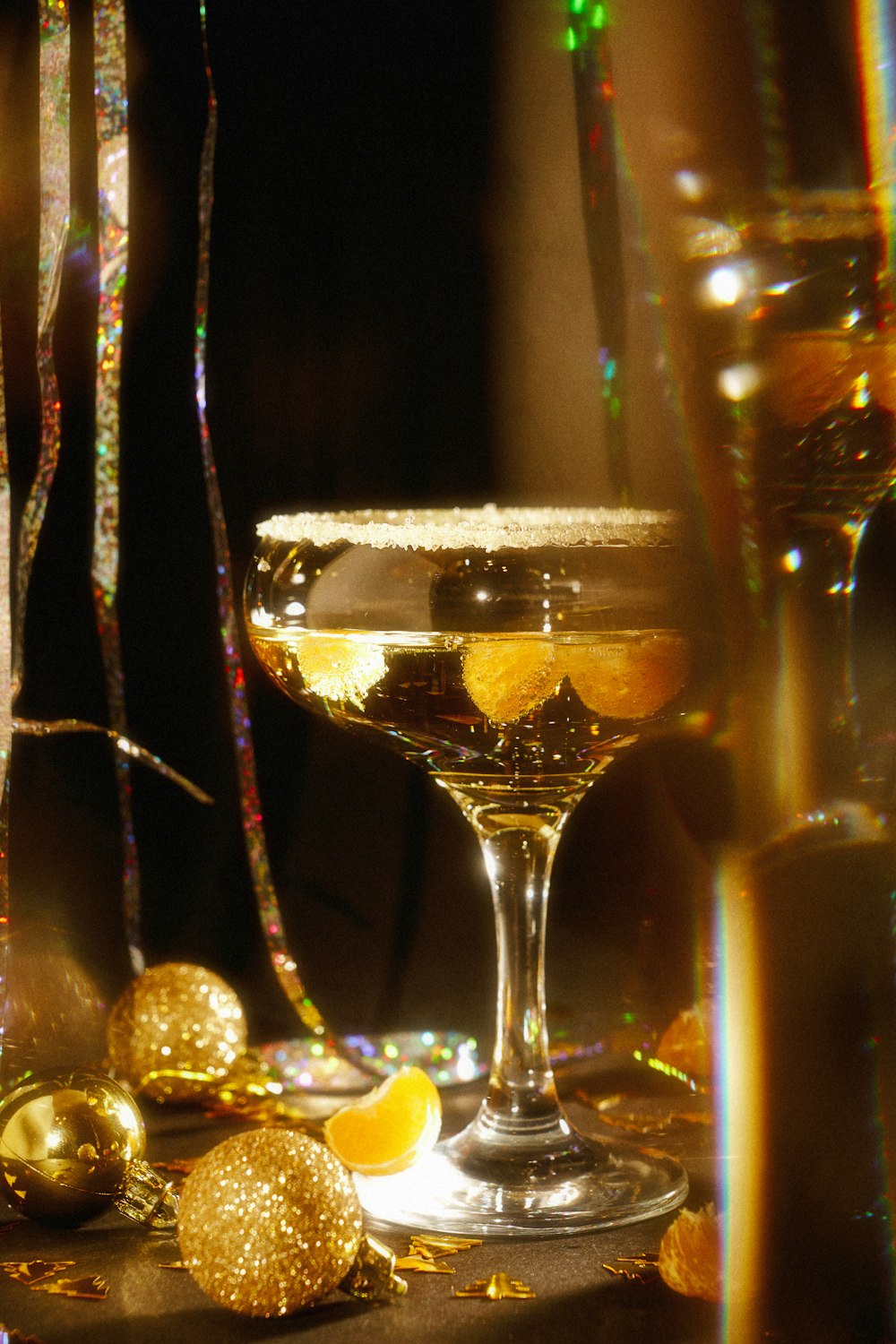 a table topped with glasses filled with liquid