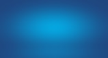 Smooth gradient background blending different shades of blue.
