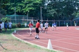 A vibrant scene from the annual sports day with children running a race