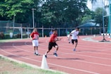 An action shot from a school sports day event.