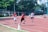 Children enjoying a sports day in a backyard.