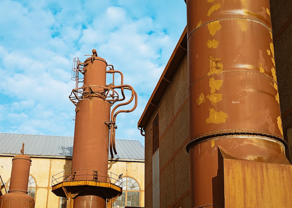 a large metal structure with a sky background