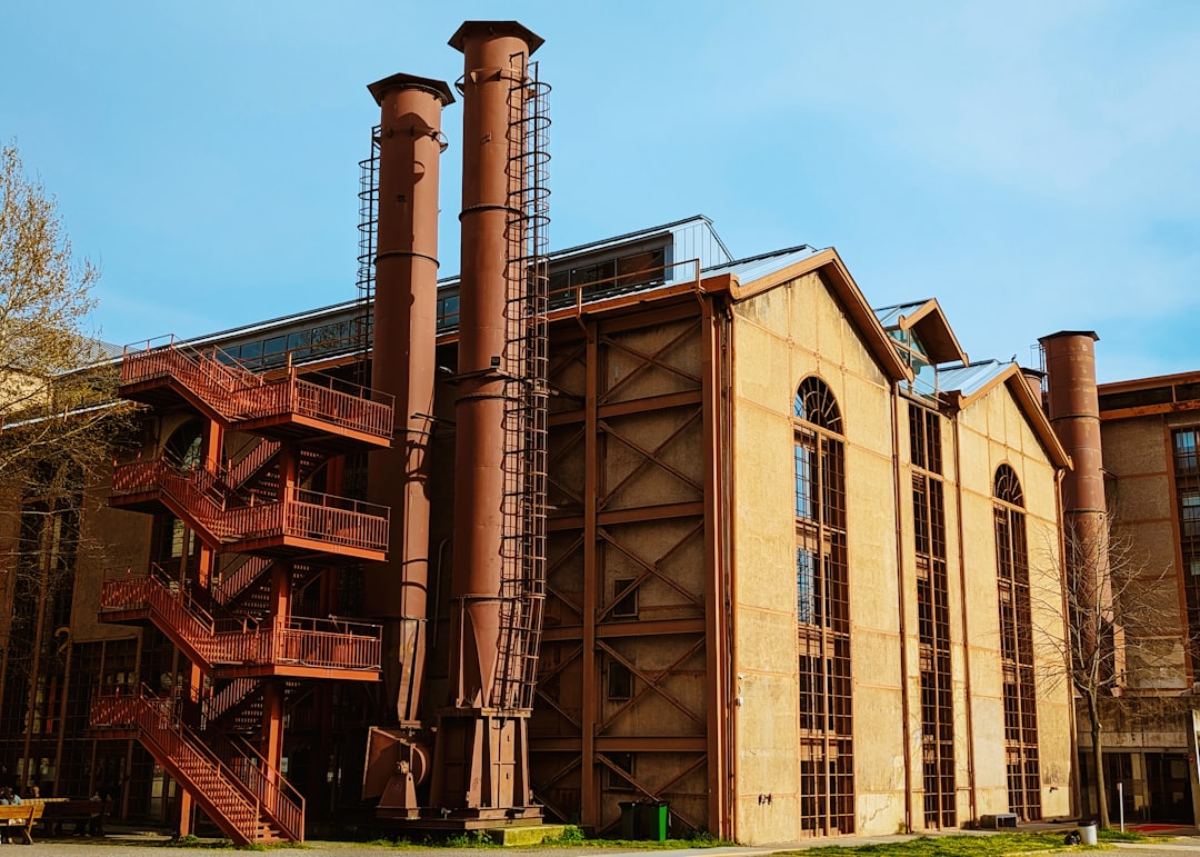 a large building with a staircase going up the side of it,