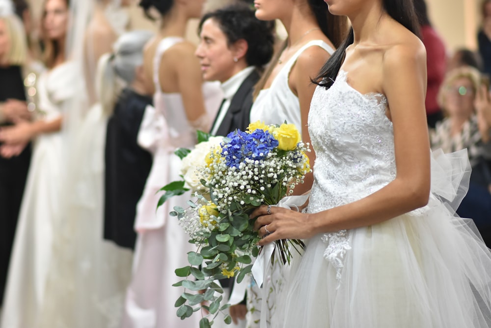 a group of women standing next to each other