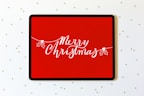 A vibrant e-card displayed on a tablet with colorful animations.