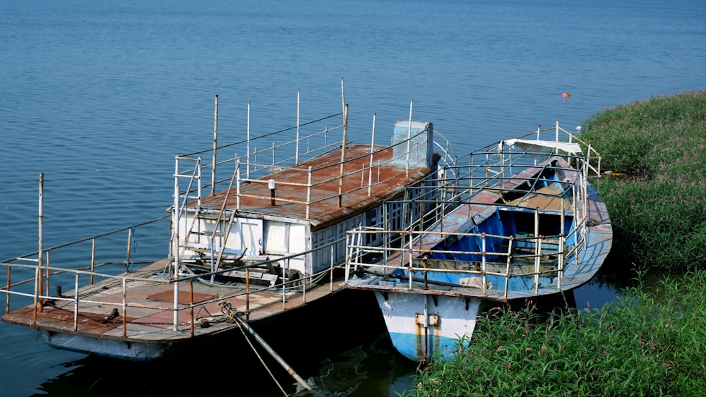 a boat sitting on top of a body of water