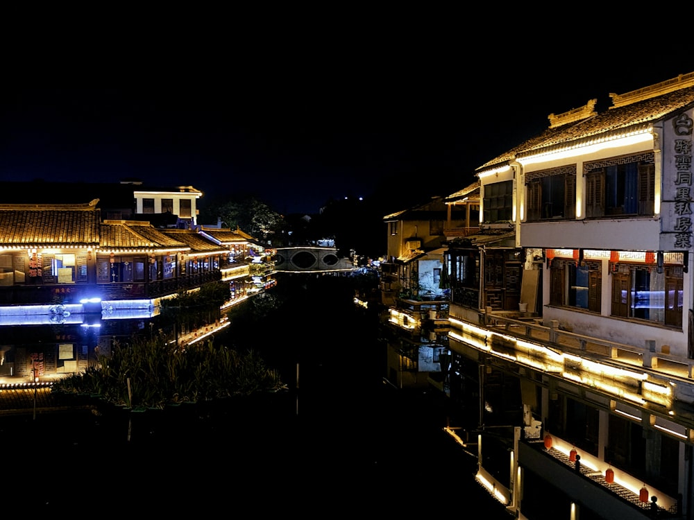 a river running through a city at night