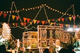 Colorful decor and lights illuminating the festival.