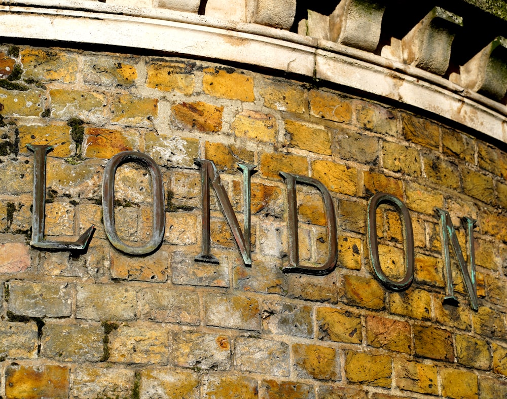 a brick building with the word london painted on it