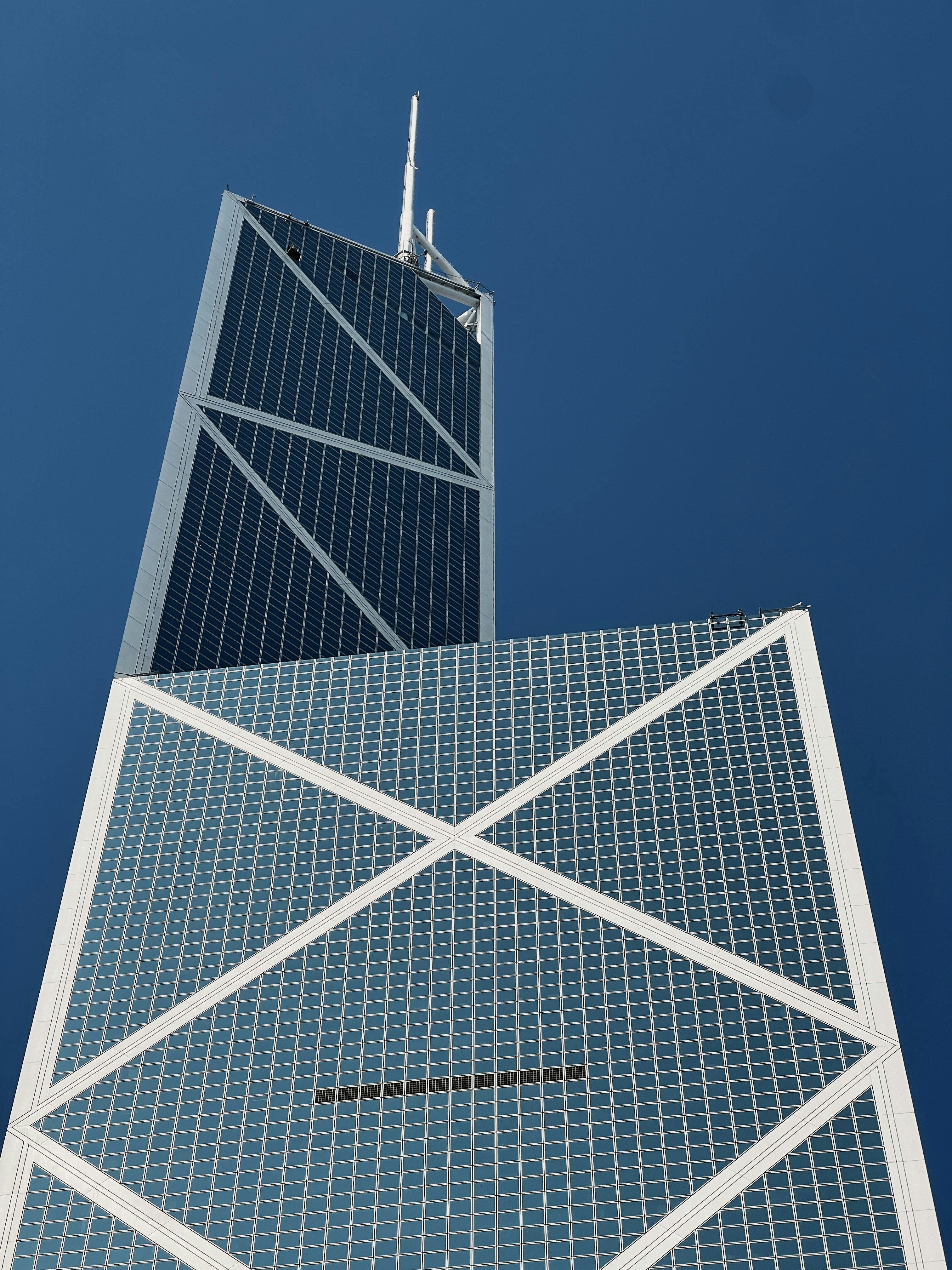 a very tall building with a sky scraper on top of it