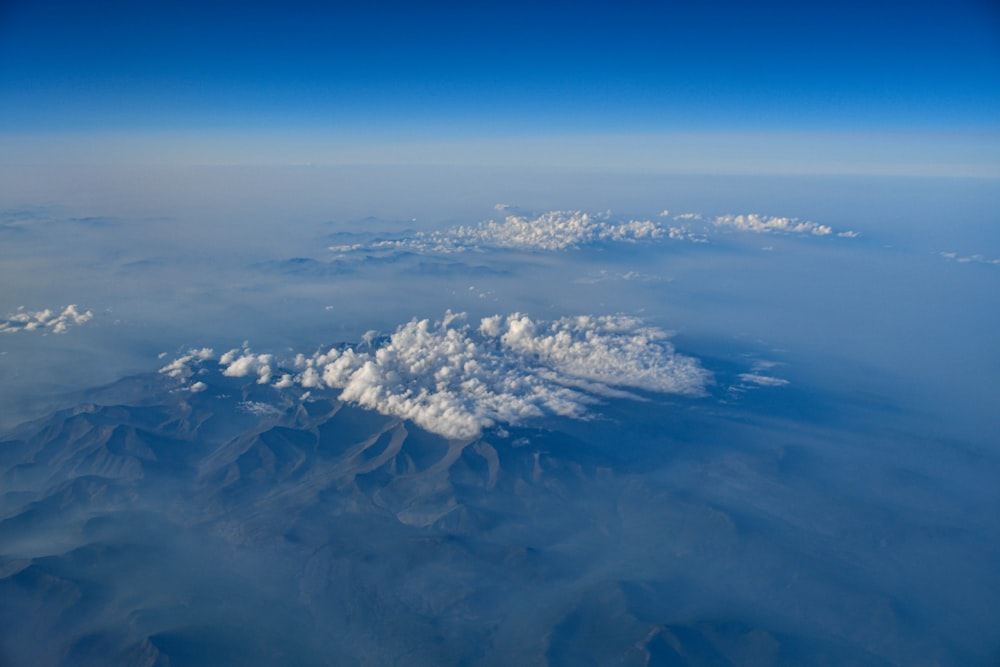 a view of a mountain range from an airplane