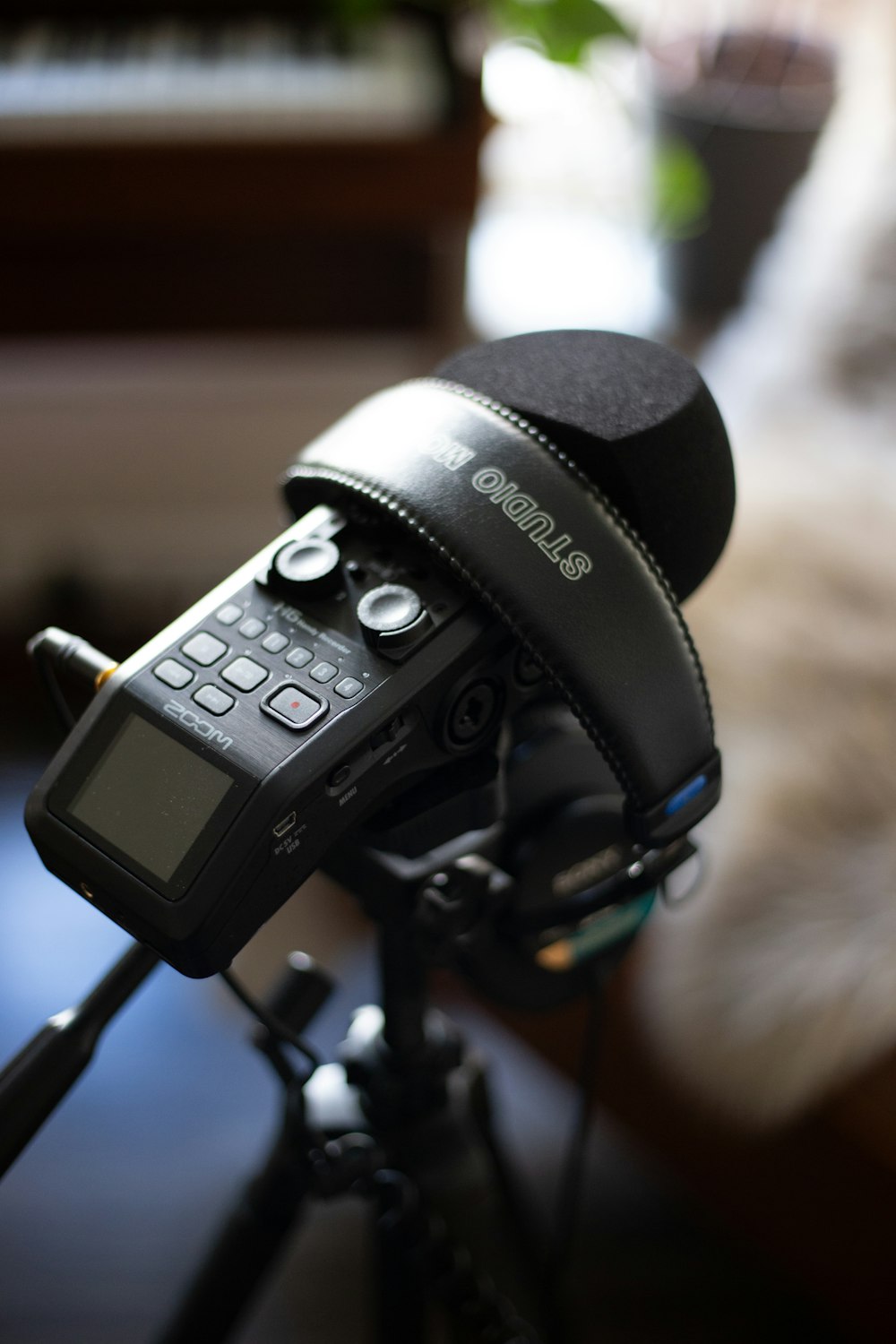 a camera sitting on top of a tripod