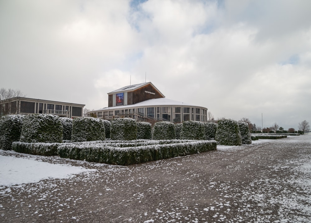 a house with a lot of snow on the ground