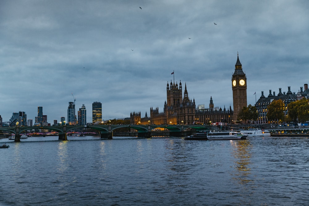 a large clock tower towering over the city of london