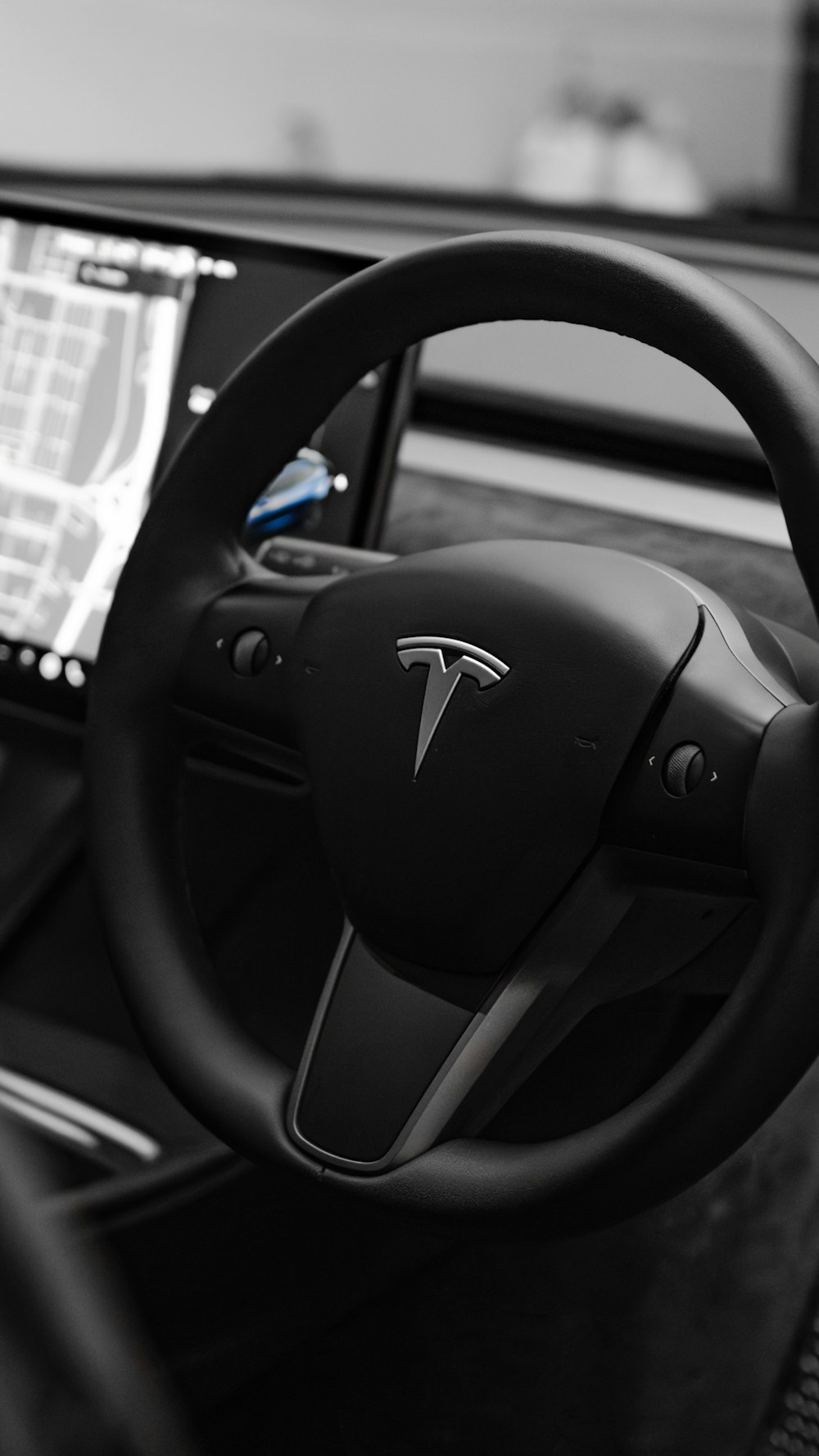 a black and white photo of a car dashboard