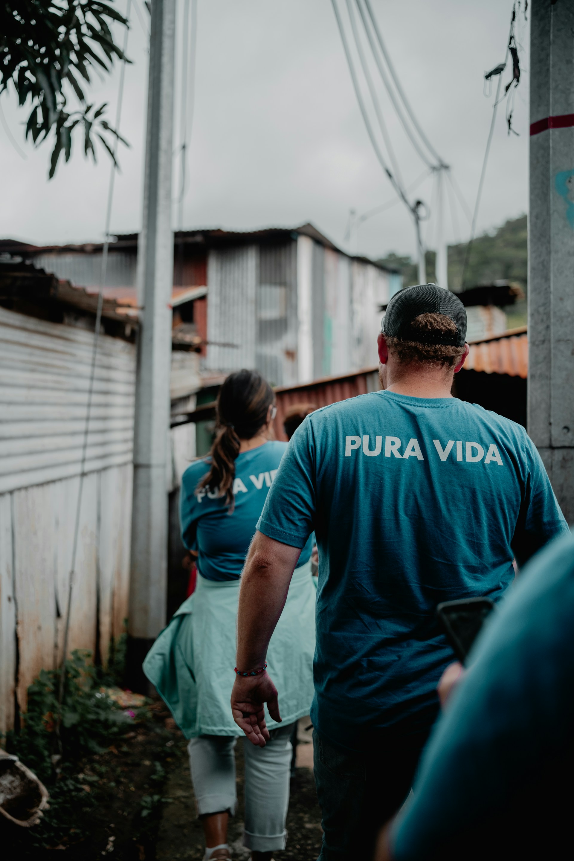 a man and a woman walking down a street