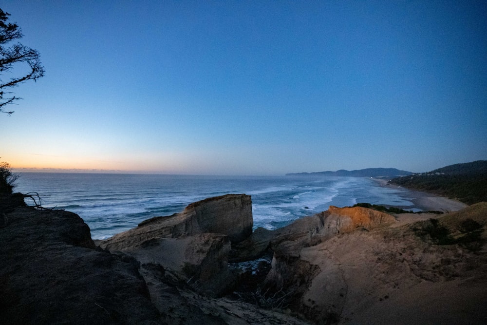 a view of the ocean from a cliff