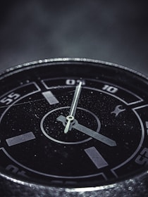 A close-up of a second hand sweeping smoothly around a clock face, symbolizing continuous time flow.