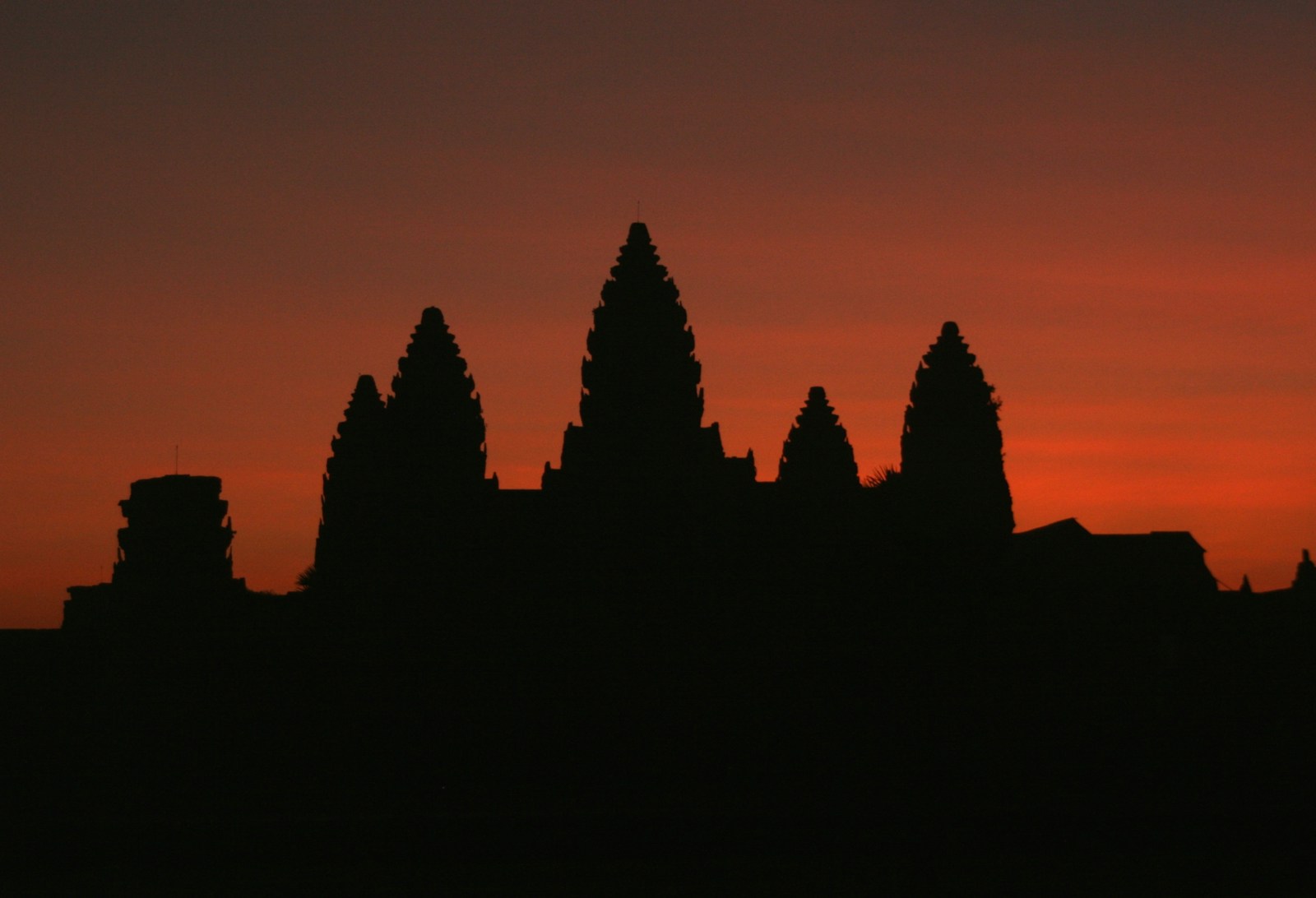 Angkor temple silhouette at sunrise