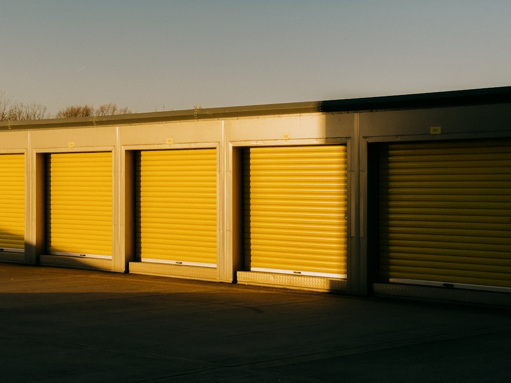 a row of storage units with closed doors